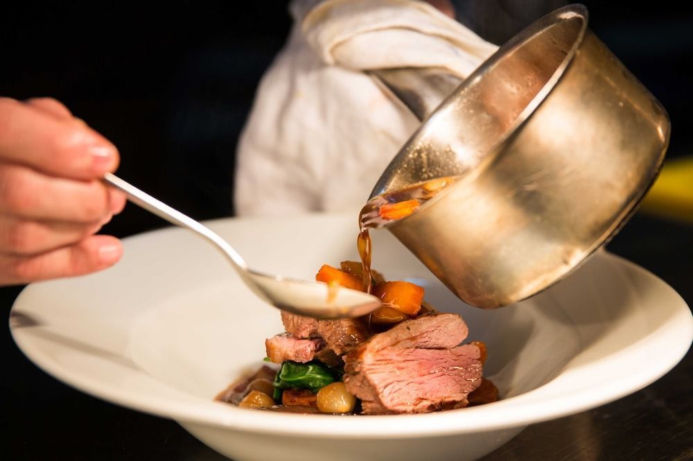 Hotel The Millstone, Mellor Blackburn  Exteriér fotografie A chef plating a dish